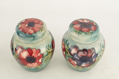 Lot 141 - A PAIR OF MOORCROFT BULBOUS GINGER JARS AND...