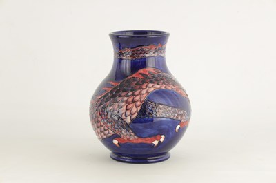 Lot 181 - A WILLIAM MOORCROFT LARGE FOOTED BULBOUS VASE...