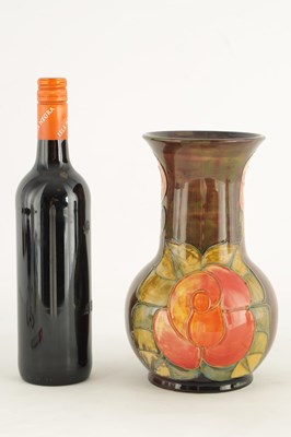 Lot 191 - A WILLIAM MOORCROFT BULBOUS VASE WITH FLARED...