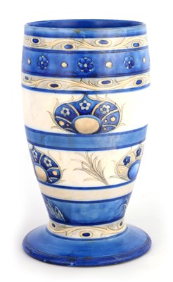 Lot 31 - A MOORCROFT FOOTED OVOID VASE decorated in the...