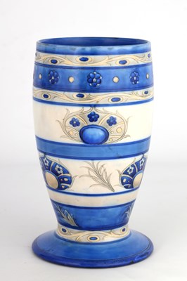Lot 31 - A MOORCROFT FOOTED OVOID VASE decorated in the...