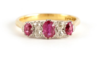 Lot 351 - A LADIES 18CT GOLD AND PLATINUM RUBY AND...