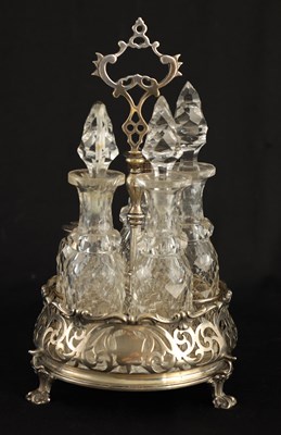 Lot 376 - AN EARLY VICTORIAN SILVER 5 BOTTLE CRUET FRAME...