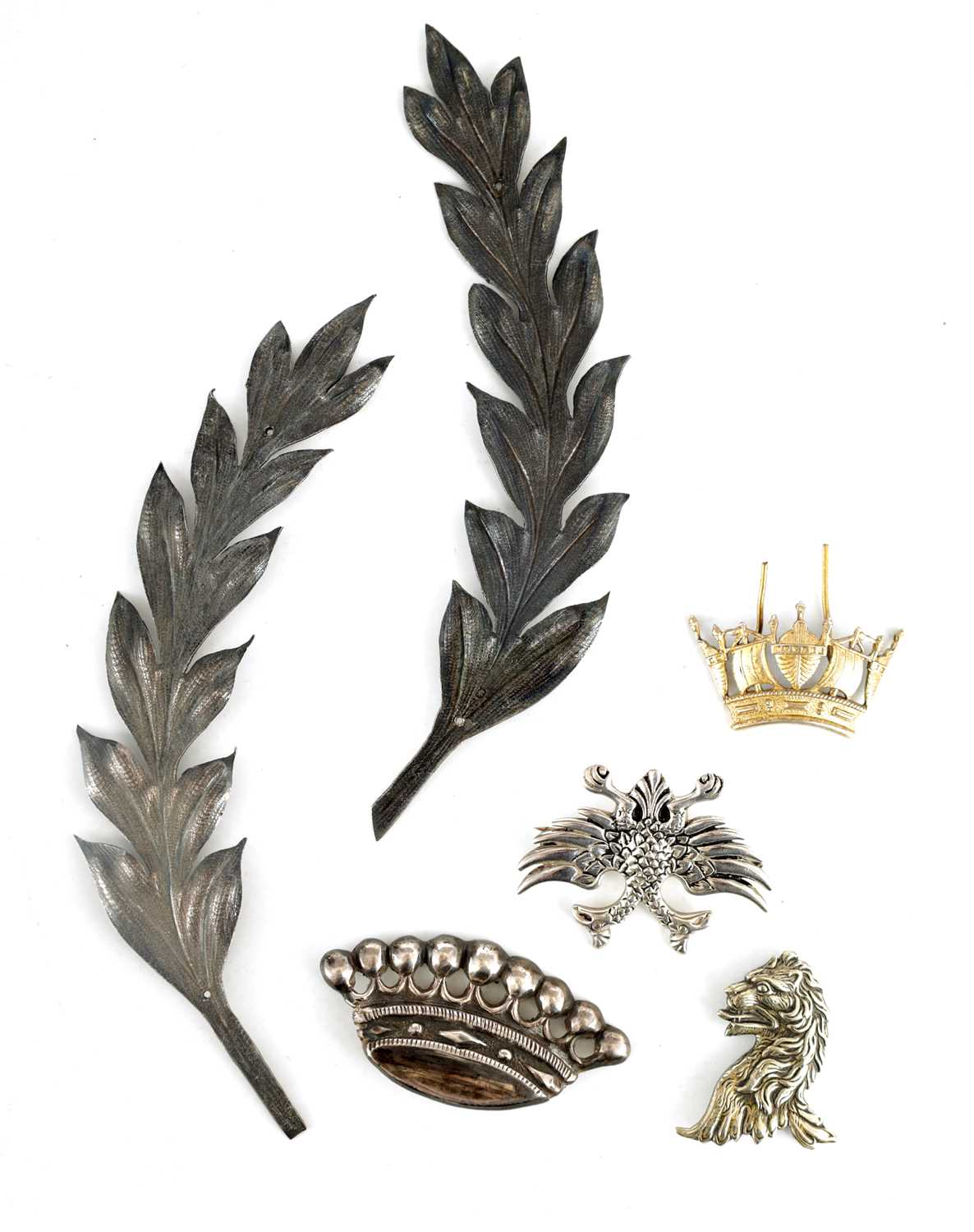 Lot 384 - A SELECTION OF SOLID SILVER BADGES AND MOUNTS...