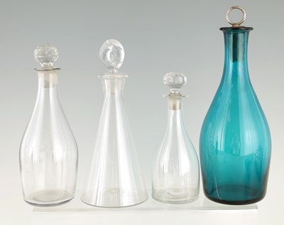 Lot 4 - A SELECTION OF FOUR GEORGIAN GLASS DECANTERS...