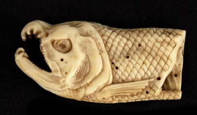 Lot 415 - A JAPANESE EDO PERIOD CARVED IVORY NETSUKE...