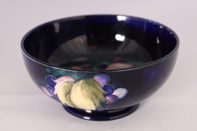 Lot 43 - A 1930S MOORCROFT FOOTED BOWL decorated in the...