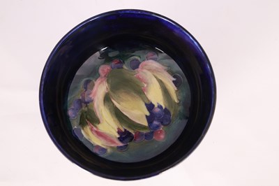 Lot 43 - A 1930S MOORCROFT FOOTED BOWL decorated in the...