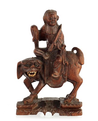 Lot 470 - A 19TH CENTURY CHINESE HARDWOOD CARVED FIGURE...