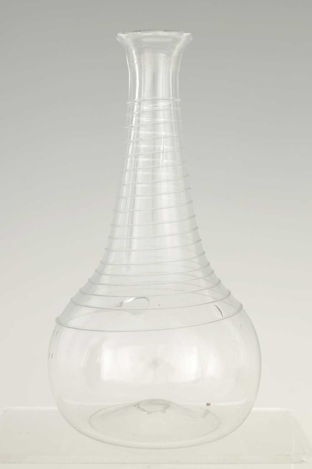 Lot 5 - AN 18TH CENTURY CLEAR GLASS DECANTER with...