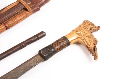 Lot 507 - A 19TH CENTURY MODANG DAYAK MANDAU SWORD...