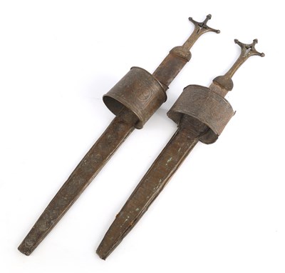 Lot 509 - A PAIR OF SUDANESE ARM DAGGERS with engraved...