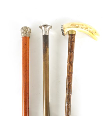 Lot 534 - A 19TH CENTURY WALKING STICK with carved...