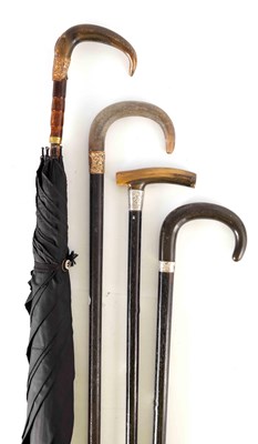 Lot 538 - A COLLECTION OF THREE WALKING CANES AND A...