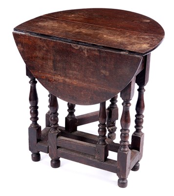 Lot 811 - A MID 18TH CENTURY SMALL OAK GATE LEG TABLE...