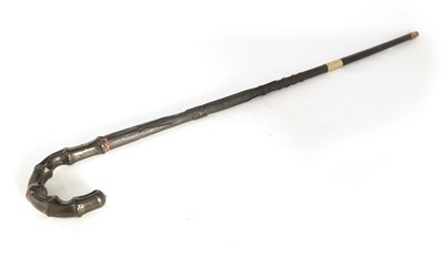 Lot 541 - A 19TH CENTURY IRISH BOG OAK WALKING STICK...