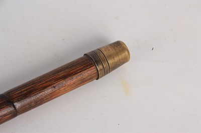 Lot 545 - A 19TH CENTURY PHALLIC IVORY HANDLED WALKING...