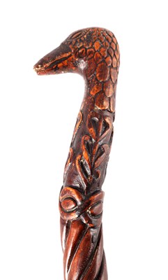 Lot 550 - A 19TH CENTURY CARVED FOLK ART WALKING STICK...