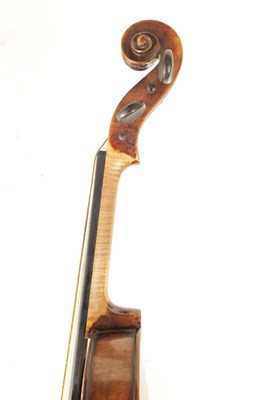 Lot 567 - AN ANTIQUE VIOLIN bearing old torn label,...
