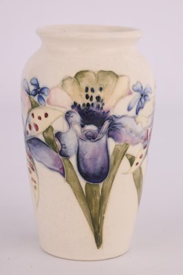 Lot 57 - A MOORCROFT SMALL TAPERING SHOULDERED VASE...