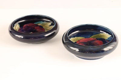 Lot 60 - TWO MOORCROFT SHALLOW SMALL DISHES WITH CURVED...
