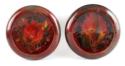 Lot 61 - A NEAR PAIR OF MOORCROFT SHALLOW SMALL DISHES...