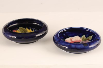 Lot 62 - TWO MOORCROFT SHALLOW SMALL DISHES WITH CURVED...