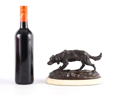 Lot 621 - A LATE 19TH CENTURY PATINATED BRONZE DOG...