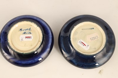 Lot 63 - TWO MOORCROFT SHALLOW SMALL DISHES WITH CURVED...