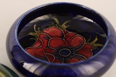 Lot 65 - TWO MOORCROFT SHALLOW SMALL DISHES WITH CURVED...