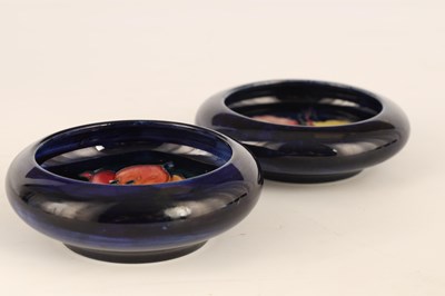 Lot 66 - TWO MOORCROFT SHALLOW SMALL DISHES WITH CURVED...