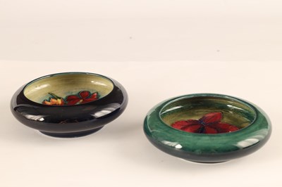 Lot 78 - TWO MOORCROFT SHALLOW SMALL DISHES WITH CURVED...
