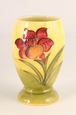 Lot 81 - A WALTER MOORCROFT SMALL FOOTED OVOID VASE...
