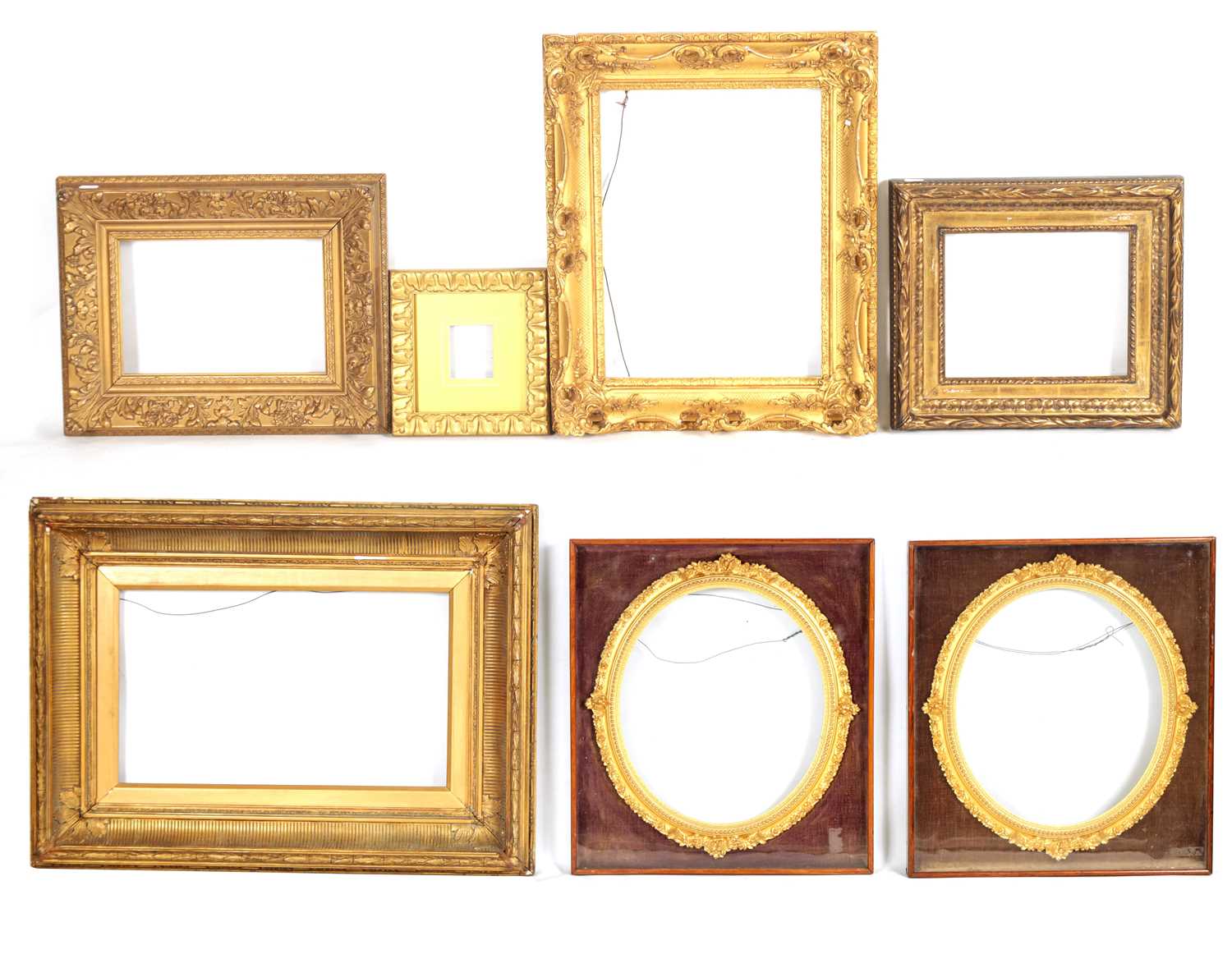 Lot 816 - A SELECTION OF SEVEN GILT SWEPT FRAMES two...