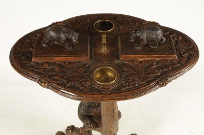 Lot 969 - A LATE 19TH CENTURY SWISS CARVED BLACK FOREST...