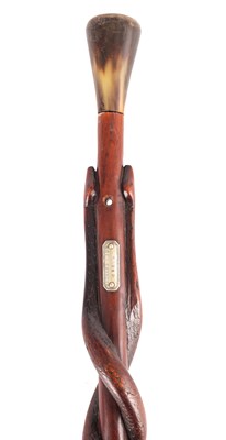 Lot 387 - A 19TH CENTURY FOLK ART WALNUT WALKING STICK