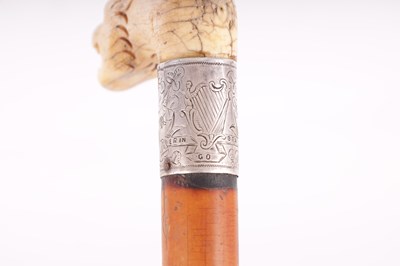 Lot 396 - THREE 19TH CENTURY ANIMAL HEAD WALKING STICKS