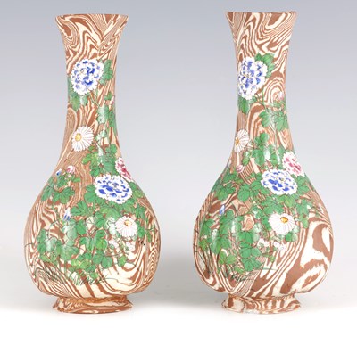 Lot 61 - A PAIR OF MEIJI PERIOD JAPANESE MARBLED BISC POTTERY NERIAGE NERIKOMI BANKO VASES