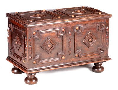 Lot 1138 - AN EARLY 18TH CENTURY AND LATER OAK GEOMETRIC MOULDED COFFER BACH