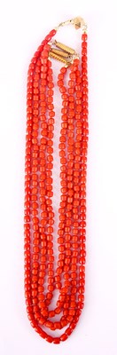 Lot 197 - A SET OF FOUR CORAL BEAD NECKLACES with gold...