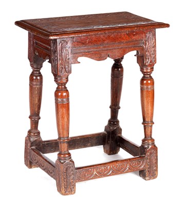 Lot 1123 - A 19TH CENTURY CARVED OAK JOINT STOOL