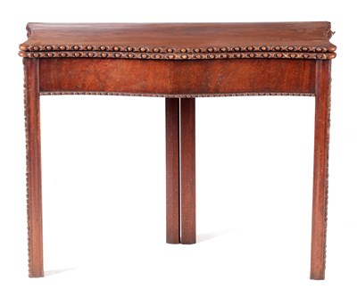 Lot 974 - A GEORGE III FIGURED MAHOGANY SERPENTINE SHAPED CHIPPENDALE STYLE TEA TABLE