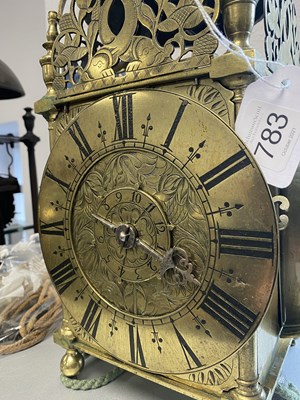 Lot 783 - A LATE 17TH CENTURY WINGED BRASS LANTERN CLOCK WITH ALARM
