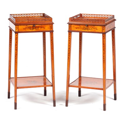 Lot 1030 - A PAIR OF 19TH CENTURY SHERATON STYLE  PAINTED SATINWOOD URN STANDS