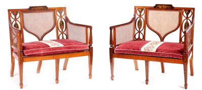 Lot 1004 - A PAIR OF 19TH CENTURY PAINTED SATINWOOD SHERATON STYLE TWO SEATER SETTEES