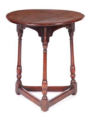 Lot 1017 - AN EARLY 18TH CENTURY OAK CRICKET TABLE OF FINE COLOUR AND PATINA