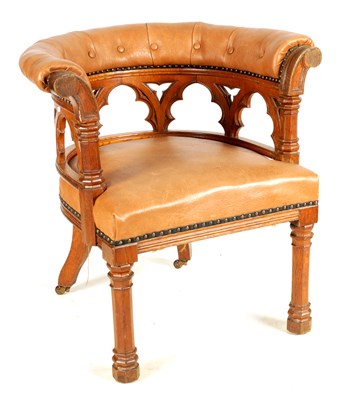 Lot 1031 - A 19TH CENTURY OAK GOTHIC STYLE UPHOLSTERED LEATHER DESK CHAIR IN THE MANNER OF PUGIN