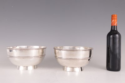 Lot 59 - A LARGE PAIR OF LATE 19TH CENTURY CHINESE SILVER BOWLS OF MILITARY INTEREST