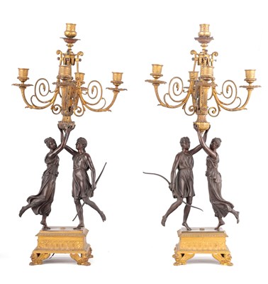 Lot 570 - A PAIR OF 19TH CENTURY ORMOLU AND PATINATED BRONZE FIGURAL CANDELABRA