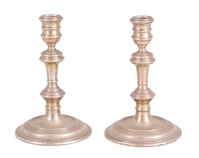 Lot 306 - A PAIR OF EARLY GEORGIAN STYLE SILVER CANDLESTICKS